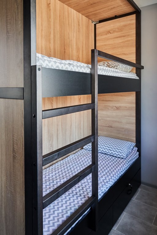 Кровать в общем номере в Baikal Capsule