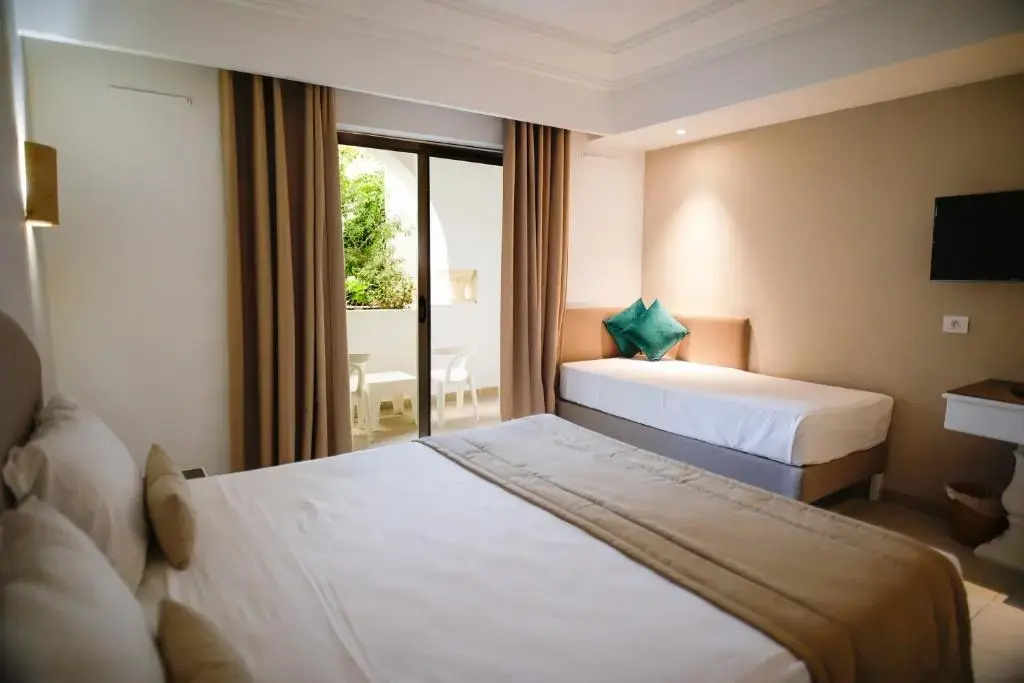Zodiac Hotel - Chambres