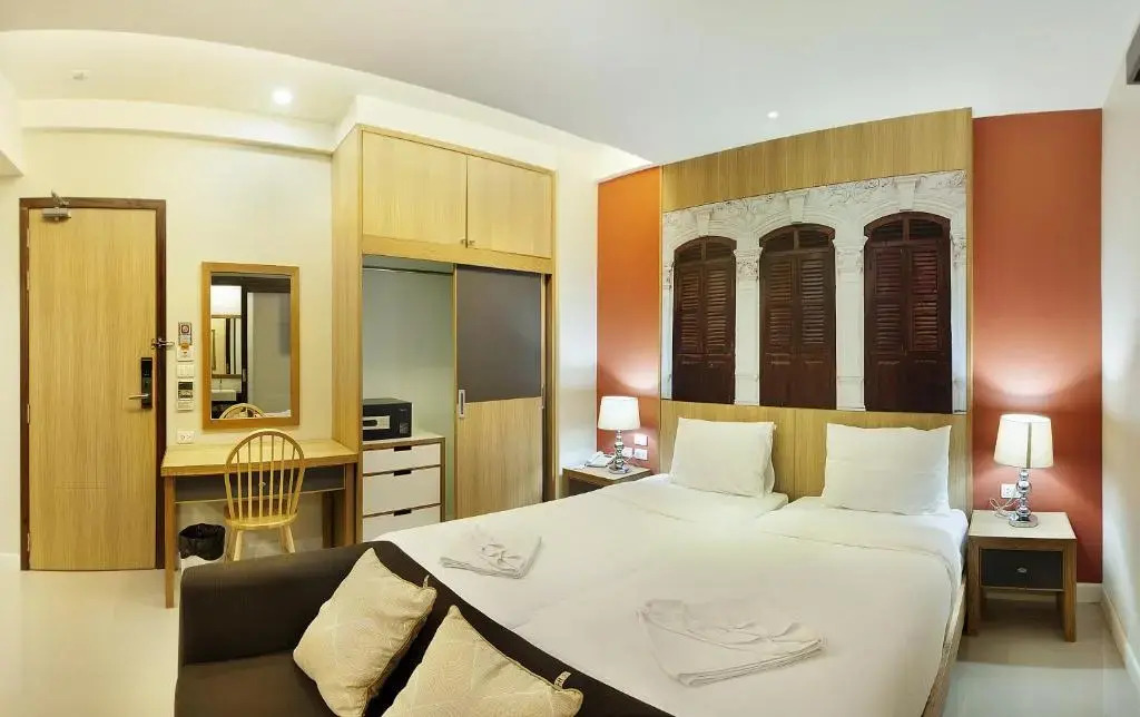 頂級客房，配有小廚房，配有雙人床。