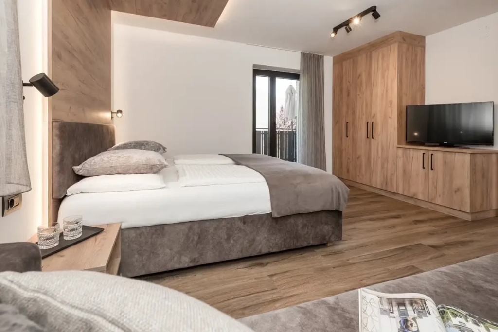 Aparthotel Familiaris - Family Apartments - Pools & Spa in the Dolomites - Chambres