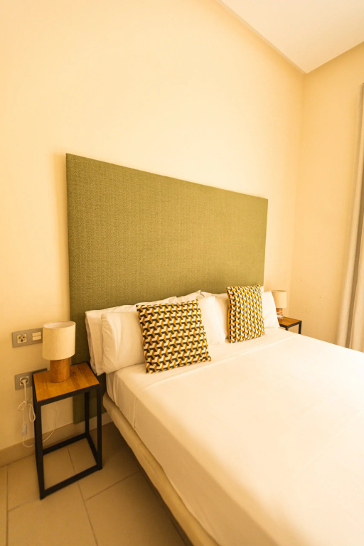 Guzman El Bueno Suites - Chambres