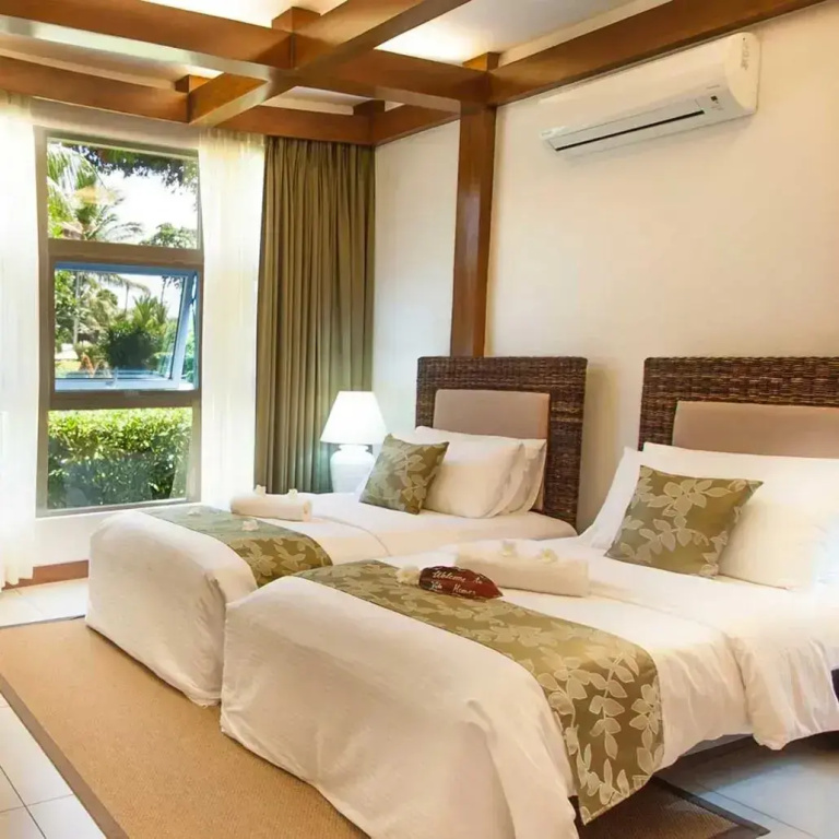Vida Homes Condo Resort - Chambres