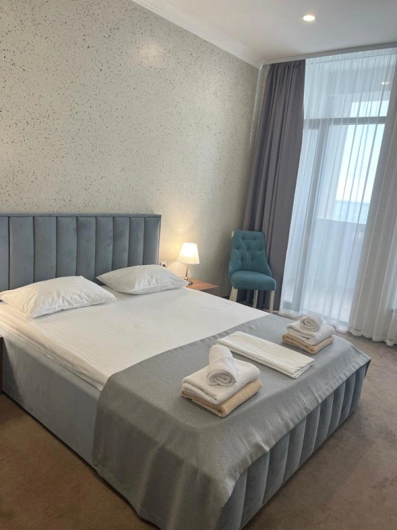 Двухместный люкс с 2 комнатами с видом на море двуспальная кровать в Нарт