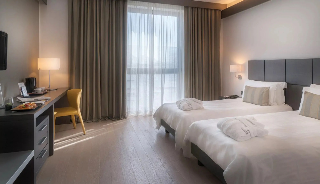 Domina Milano Fiera - Chambres