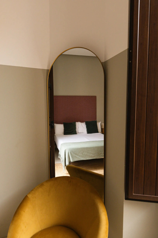 Guzman El Bueno Suites - Chambres