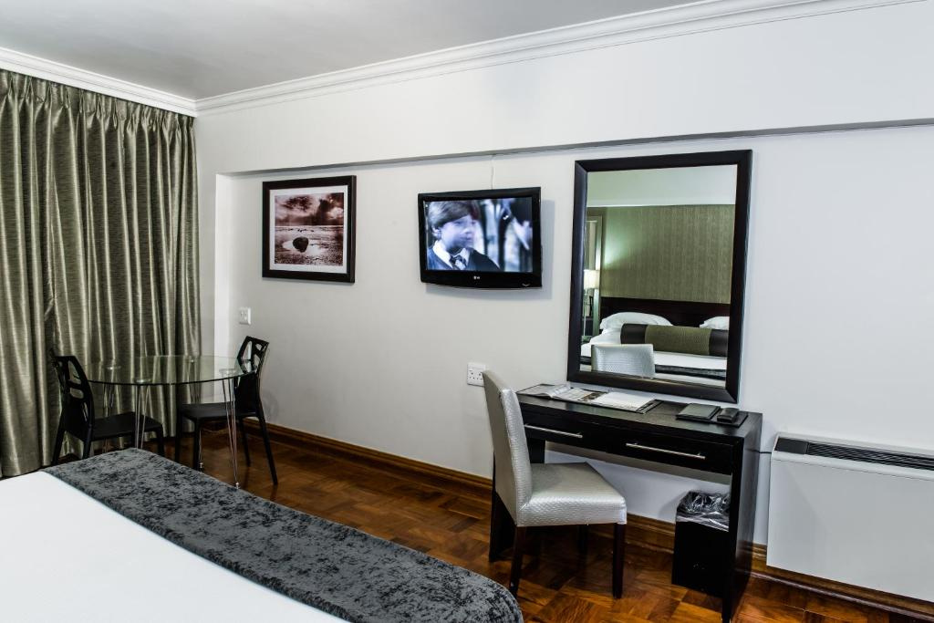 Belaire Suites - Chambres
