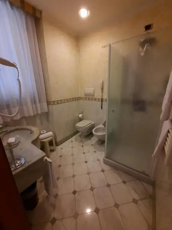 Andreola Central Hotel - Chambres