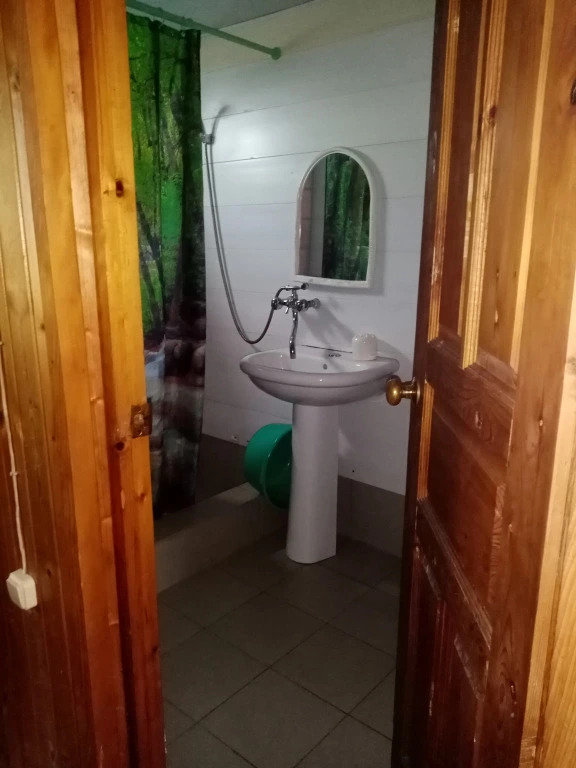 Трёхместный домик с балконом в Гостевой дом