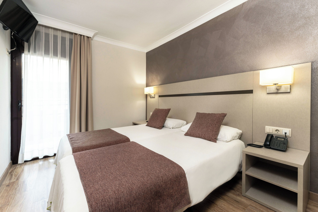 Hotel & Aparthotel Cosmos - Chambres
