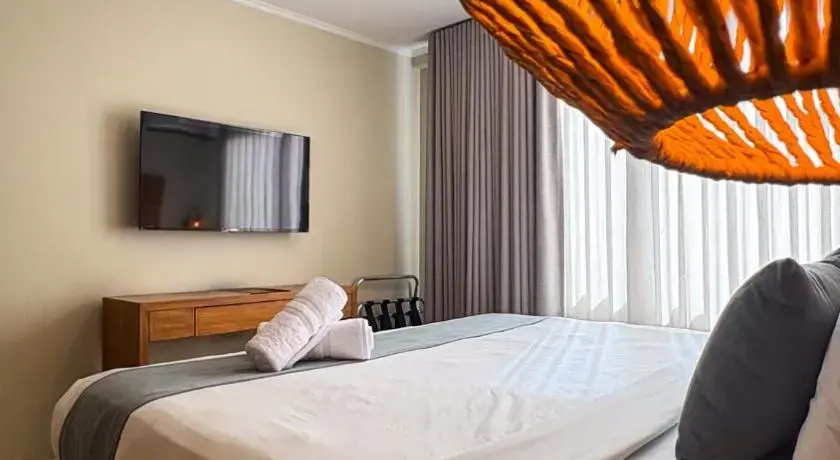 Majestic City Suites & Beach Hotel - Chambres