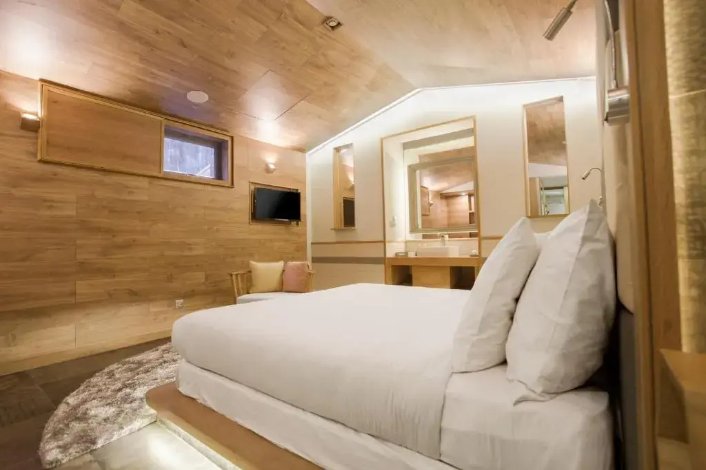 Fusion Suites Saigon - Chambres