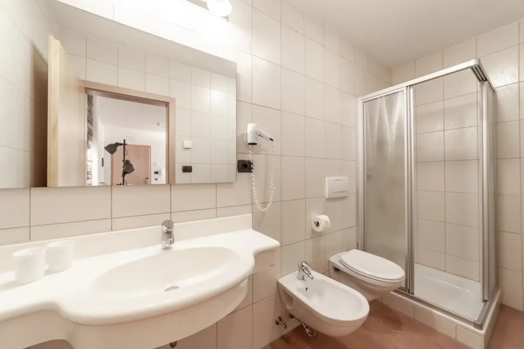 Aparthotel Familiaris - Family Apartments - Pools & Spa in the Dolomites - Chambres