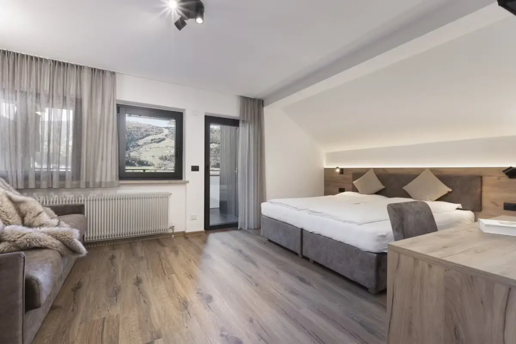 Aparthotel Familiaris - Family Apartments - Pools & Spa in the Dolomites - Chambres