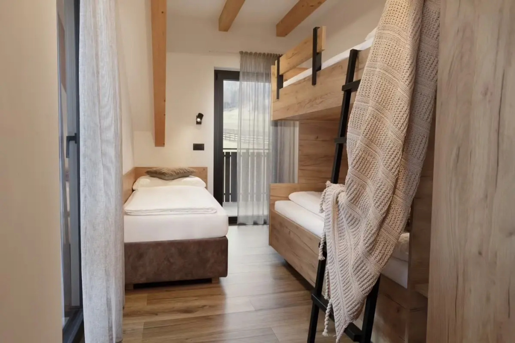 Aparthotel Familiaris - Family Apartments - Pools & Spa in the Dolomites - Chambres