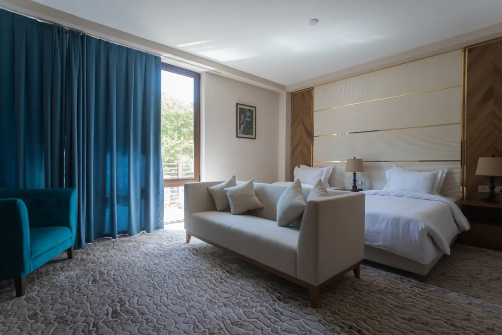 Deluxe Double room with balcony and with garden view (twin beds)