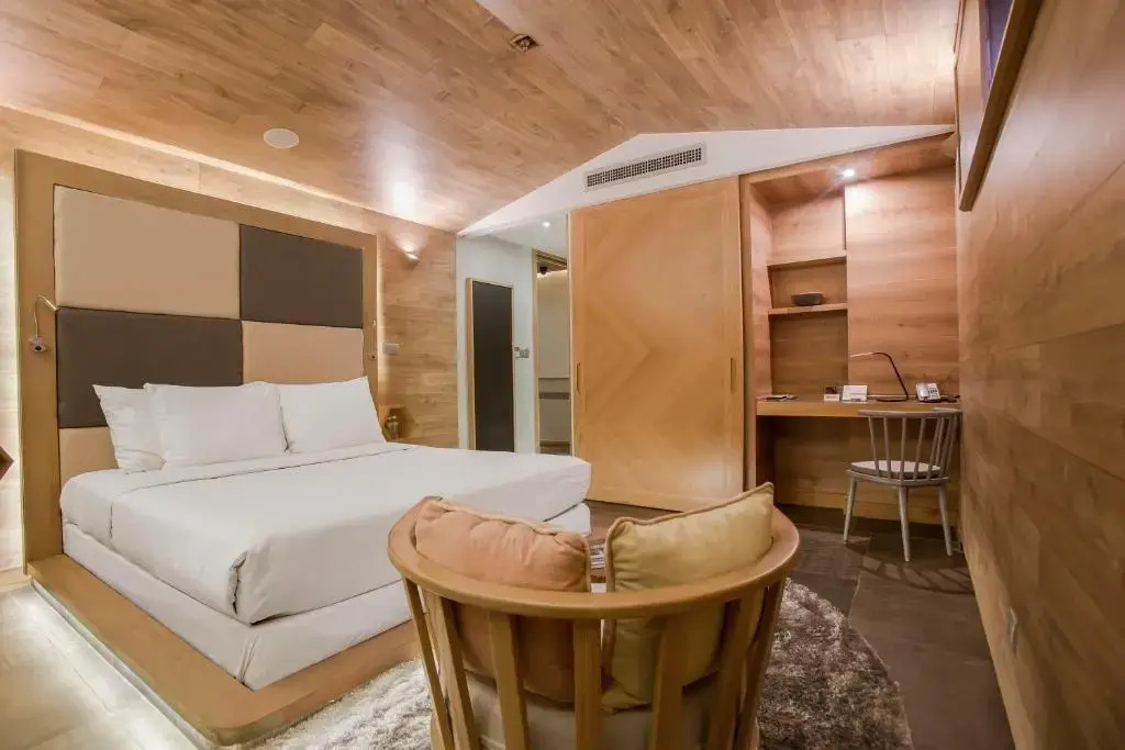 Fusion Suites Saigon - Chambres