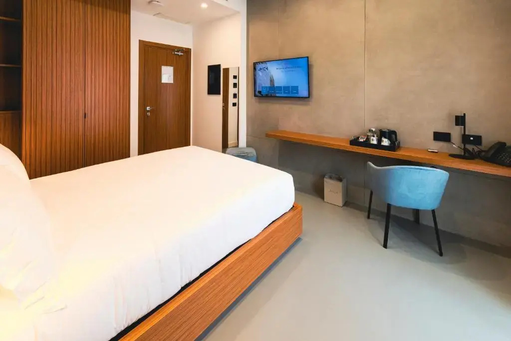 J Maluni City Hotel - Chambres