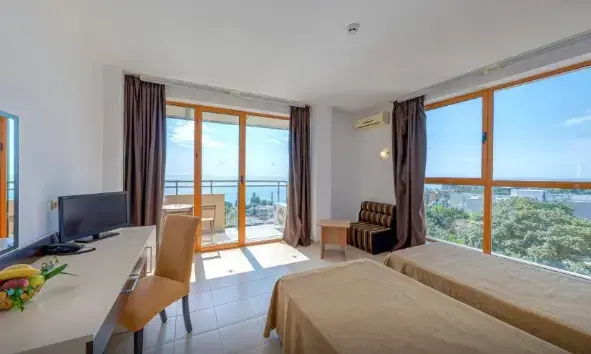 Sunrise Hotel - Chambres