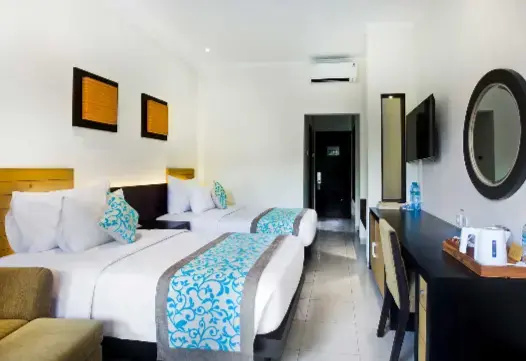 Adhi Jaya Hotel - Chambres