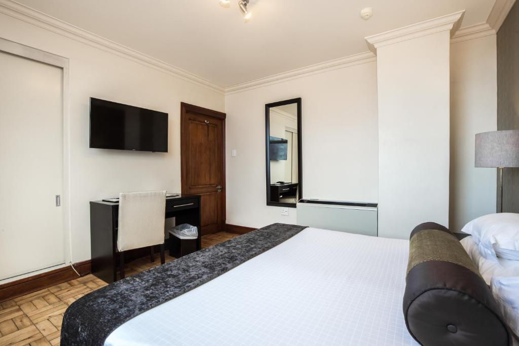 Belaire Suites - Chambres