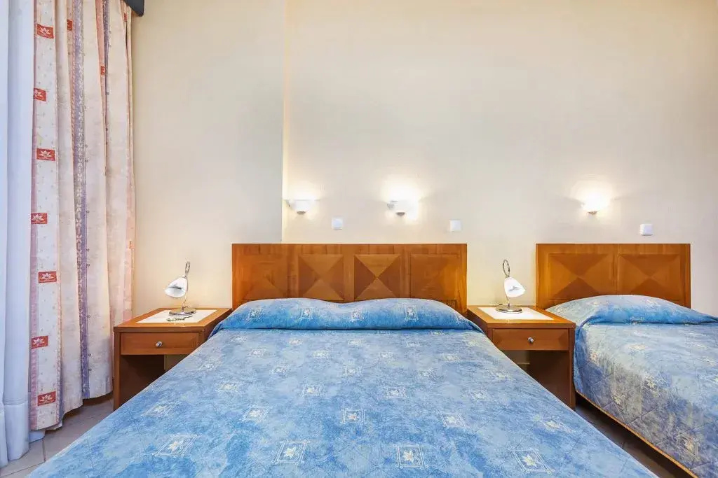 Atrium Hotel - Chambres
