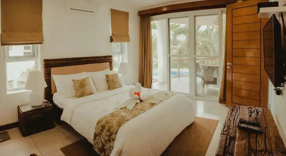 Vida Homes Condo Resort - Chambres