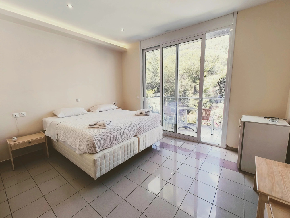 New Aegli Resort Hotel - Chambres