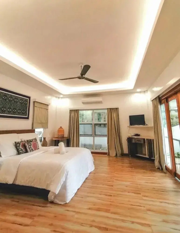 Vida Homes Condo Resort - Chambres