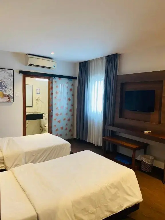 Central Park Saigon Hotel - Chambres
