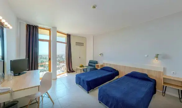 Sunrise Hotel - Chambres