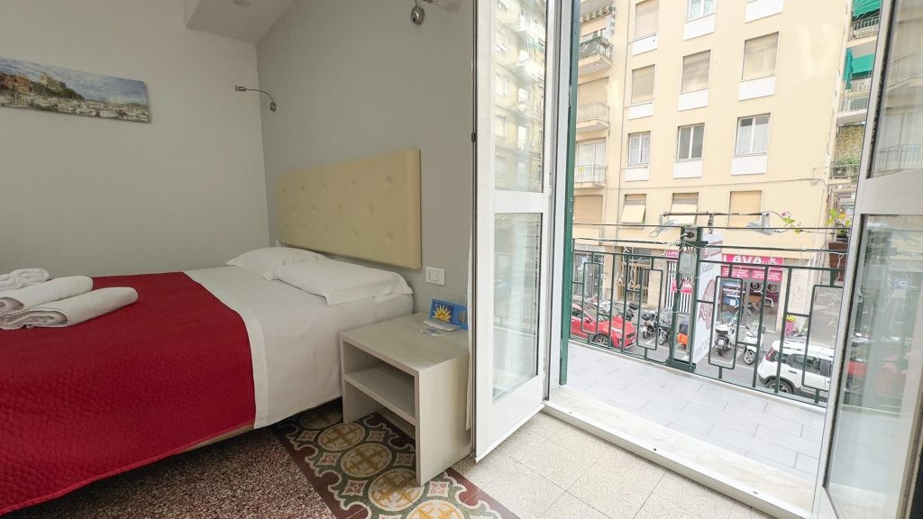 Double room with balcony and with partial sea view (full double bed)
