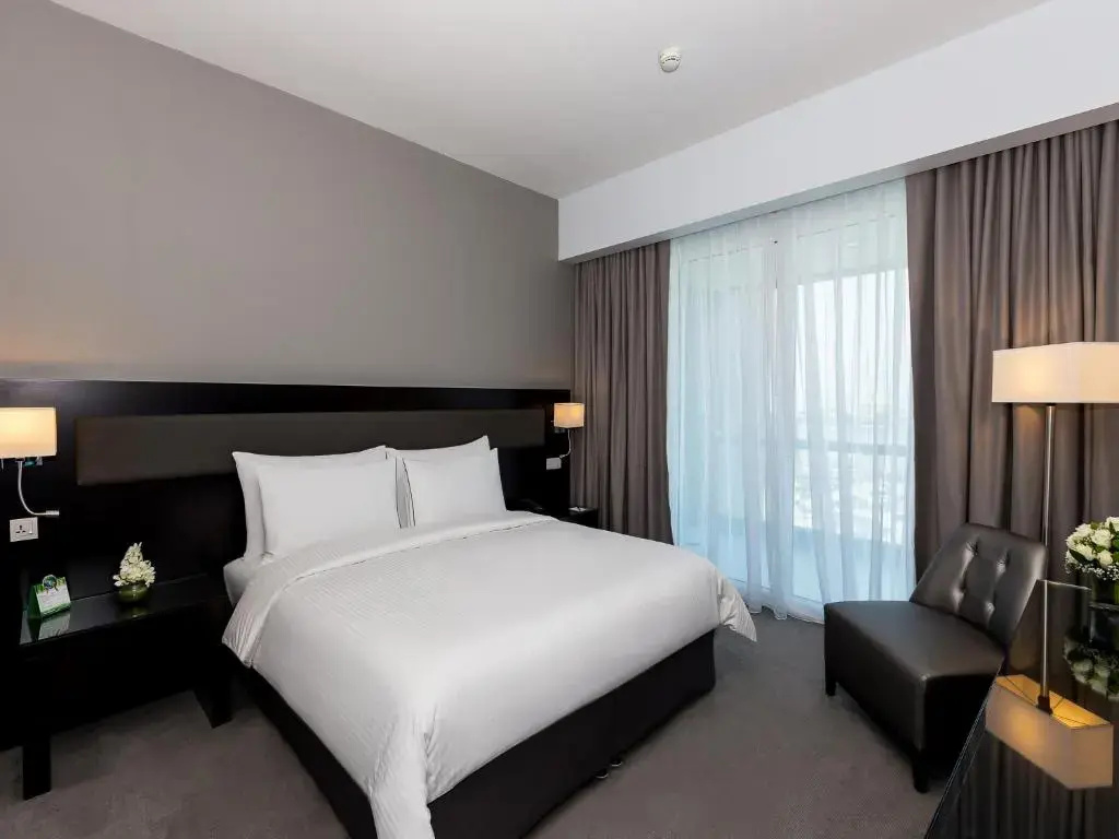 Flora Creek Deluxe Hotel Apartments Dubai - Chambres