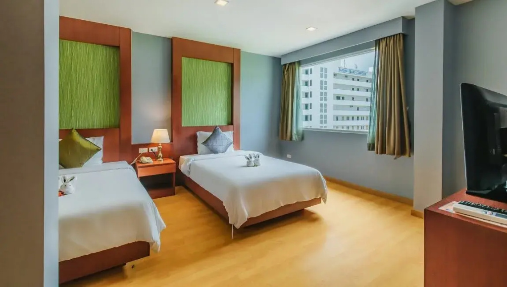 Elite Suites Patong Hotel - Chambres