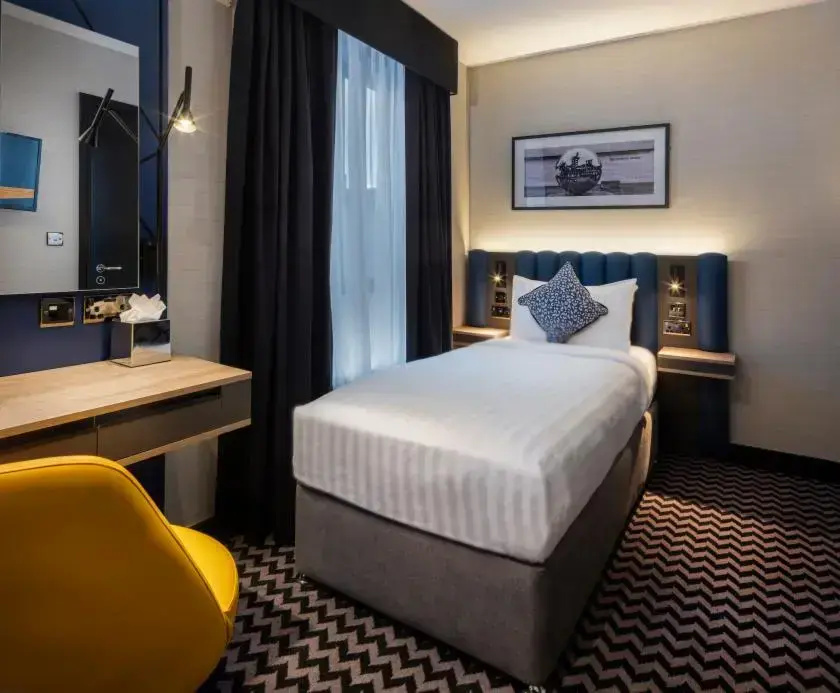 Academy Plaza Hotel - Chambres