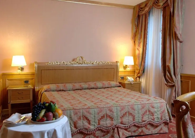 Andreola Central Hotel - Chambres