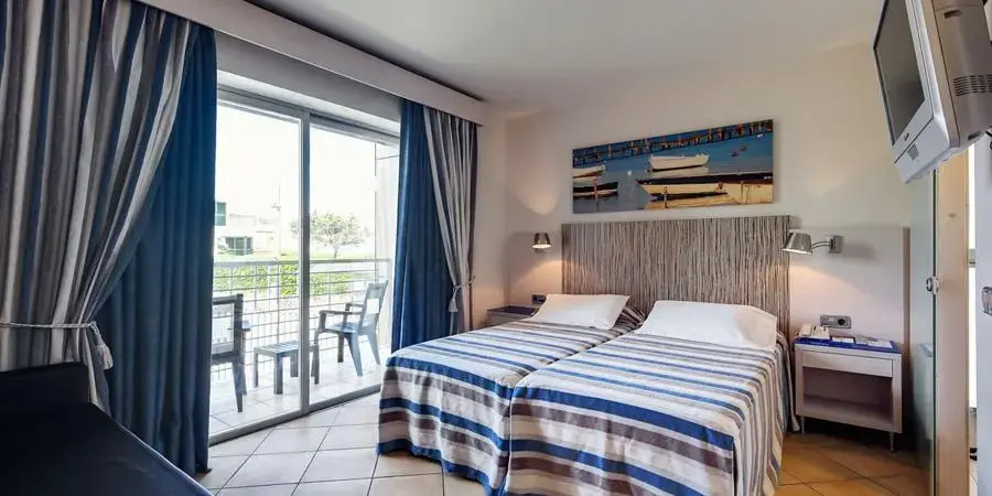 Seth Hotel Punta Prima - Chambres