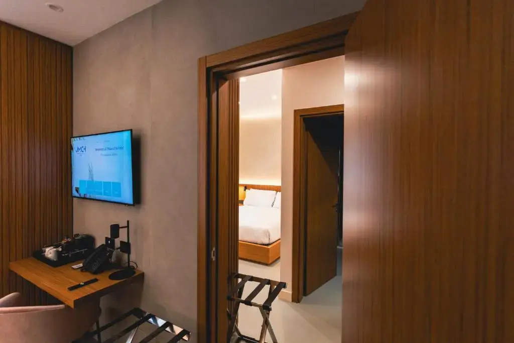 J Maluni City Hotel - Chambres
