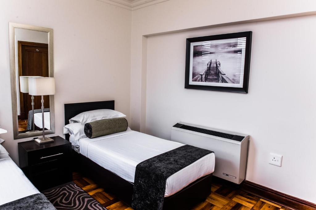 Belaire Suites - Chambres