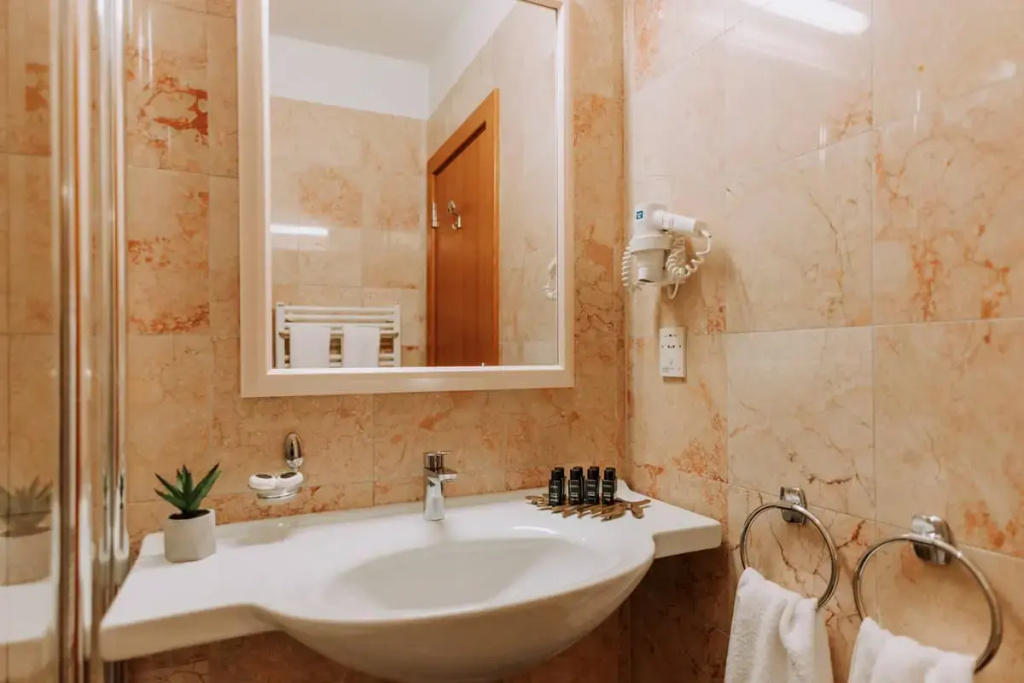 Apoksiomen Hotel - Chambres