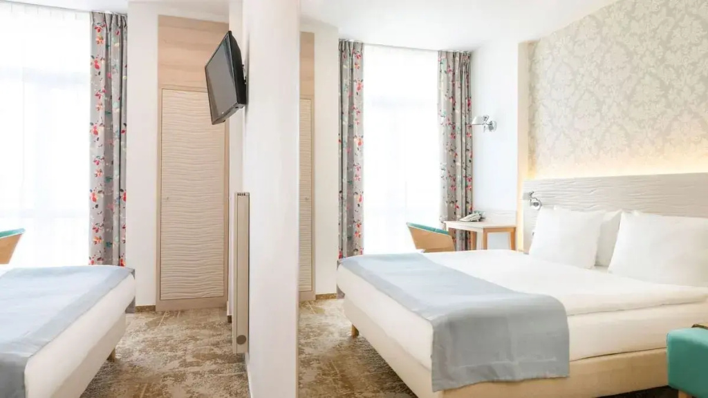 Metropol Hotel - Chambres