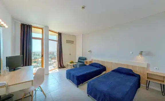 Sunrise Hotel - Chambres
