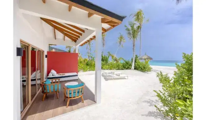 Beach Double Suite, bed type is subject to availability, speedboat transfer included, full double bed room photo 1