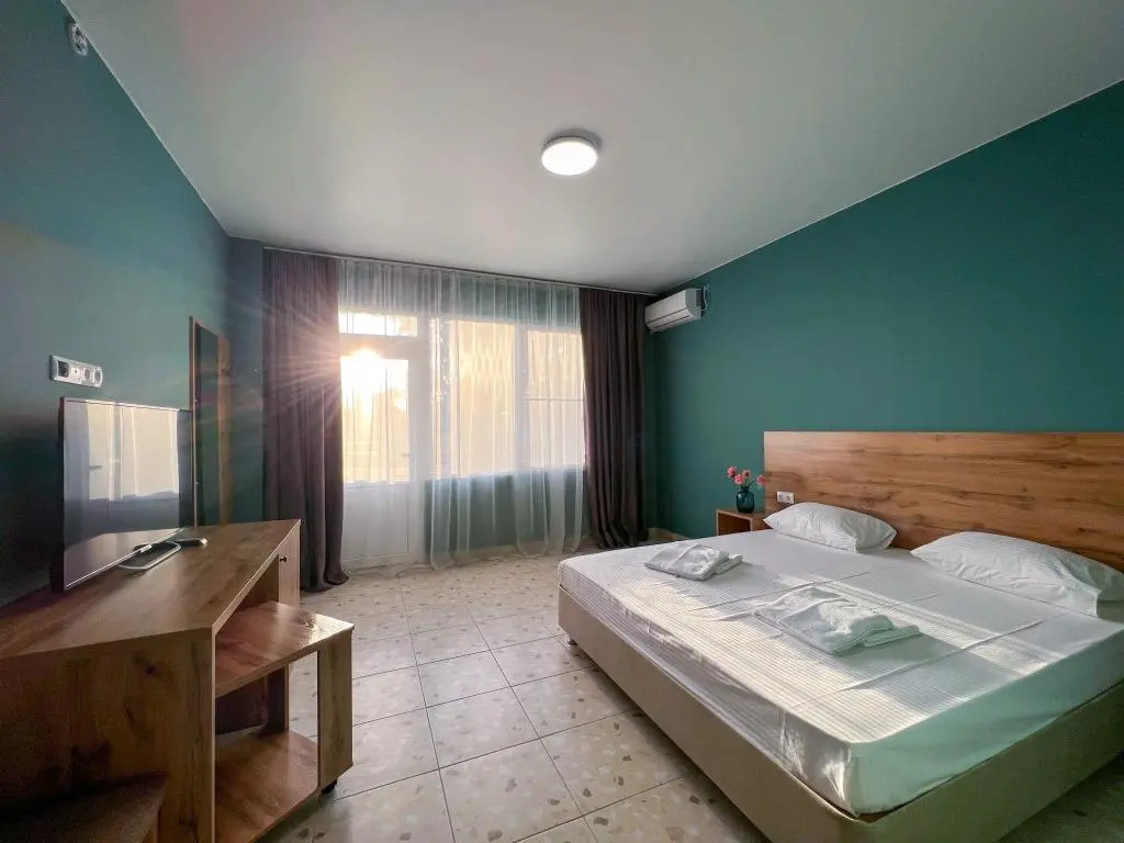 Четырёхместный номер Стандарт (корпус С) с 2 комнатами с видом на парк в Напра