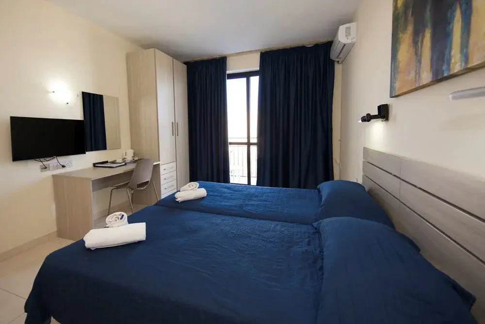 Relax Inn Hotel - Chambres