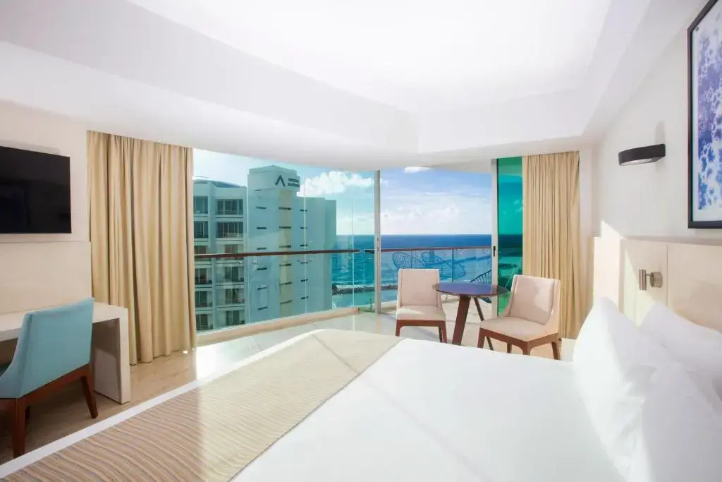 Altitude Corner Double Suite with partial ocean view full double bed