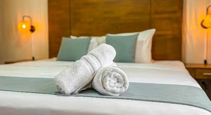 Majestic City Suites & Beach Hotel - Chambres