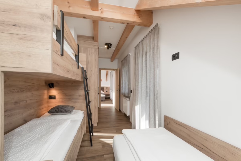 Aparthotel Familiaris - Family Apartments - Pools & Spa in the Dolomites - Chambres