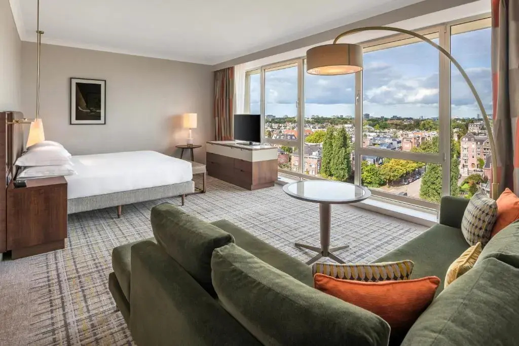 High floor Double Junior Suite with balcony and with canal view (full double bed)