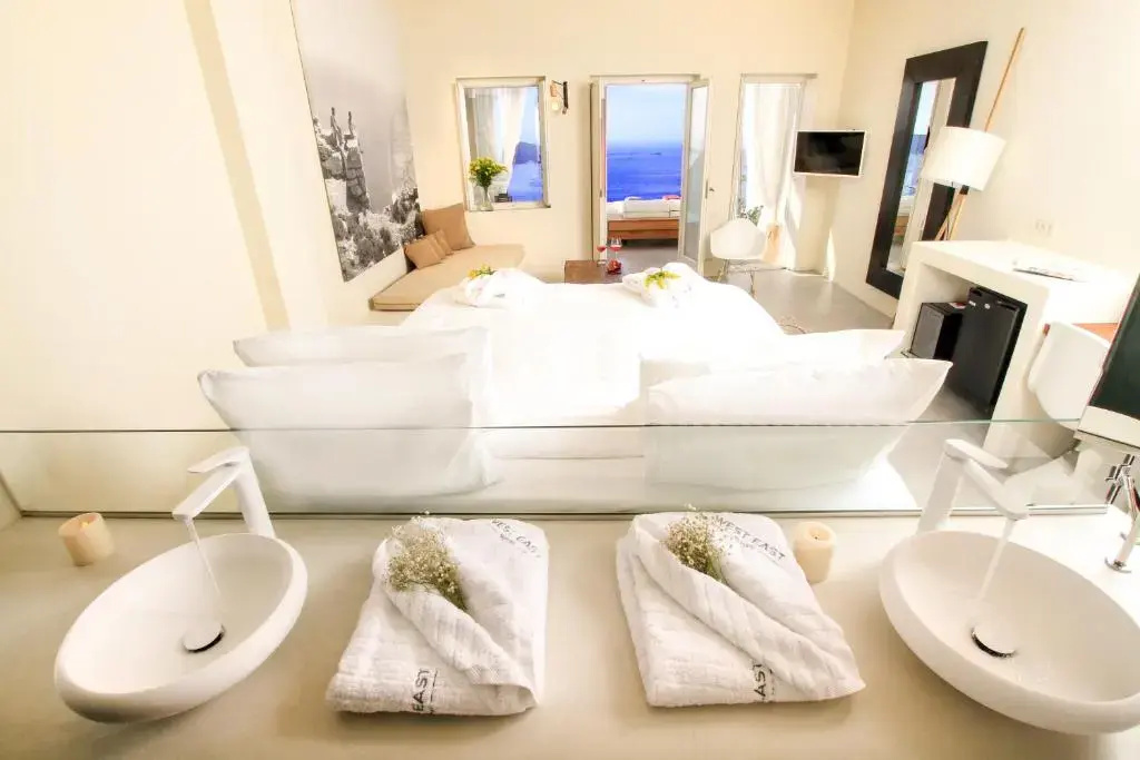 West East Suites Hotel - Chambres