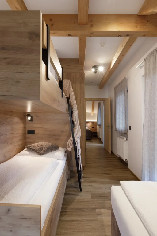 Aparthotel Familiaris - Family Apartments - Pools & Spa in the Dolomites - Chambres